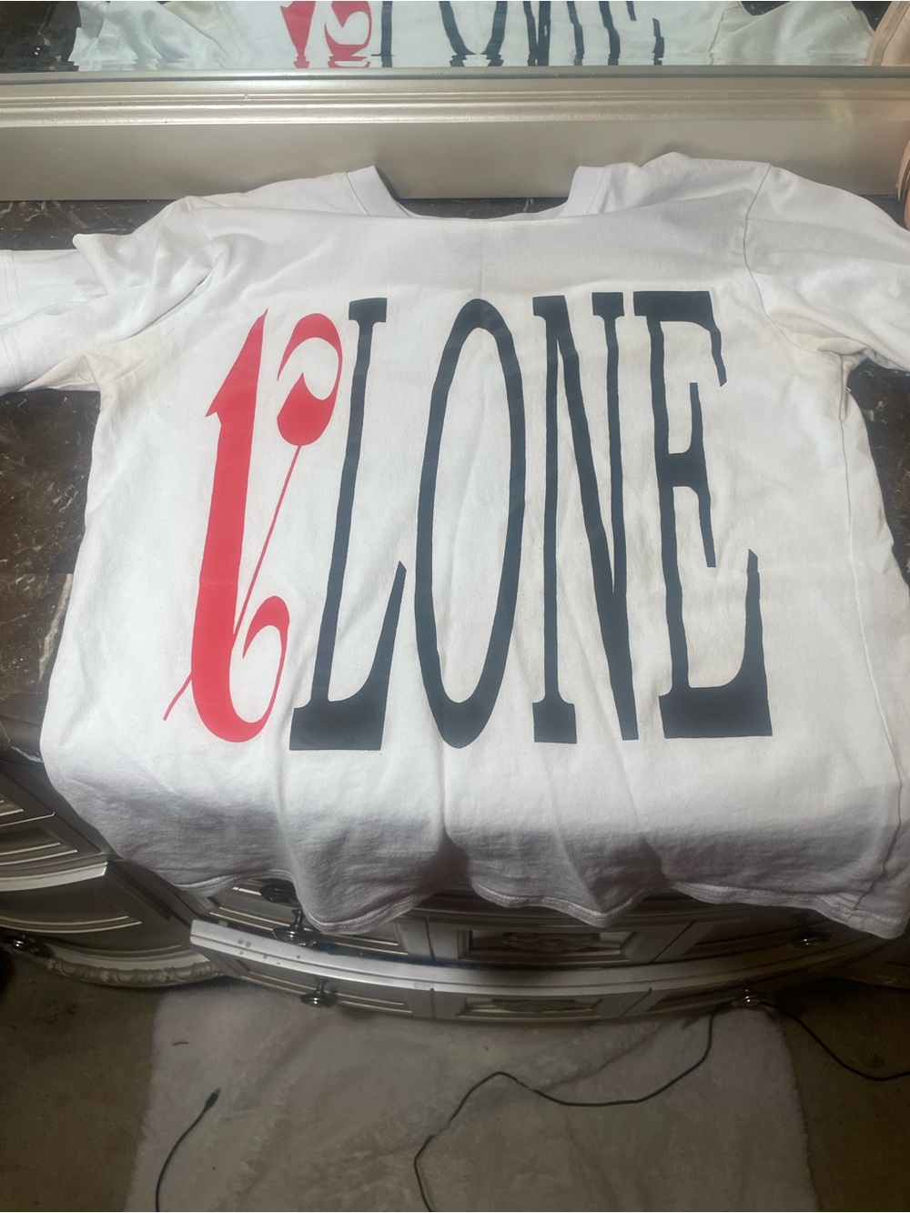 White 'VLONE' Graphic Tee with Red Accent